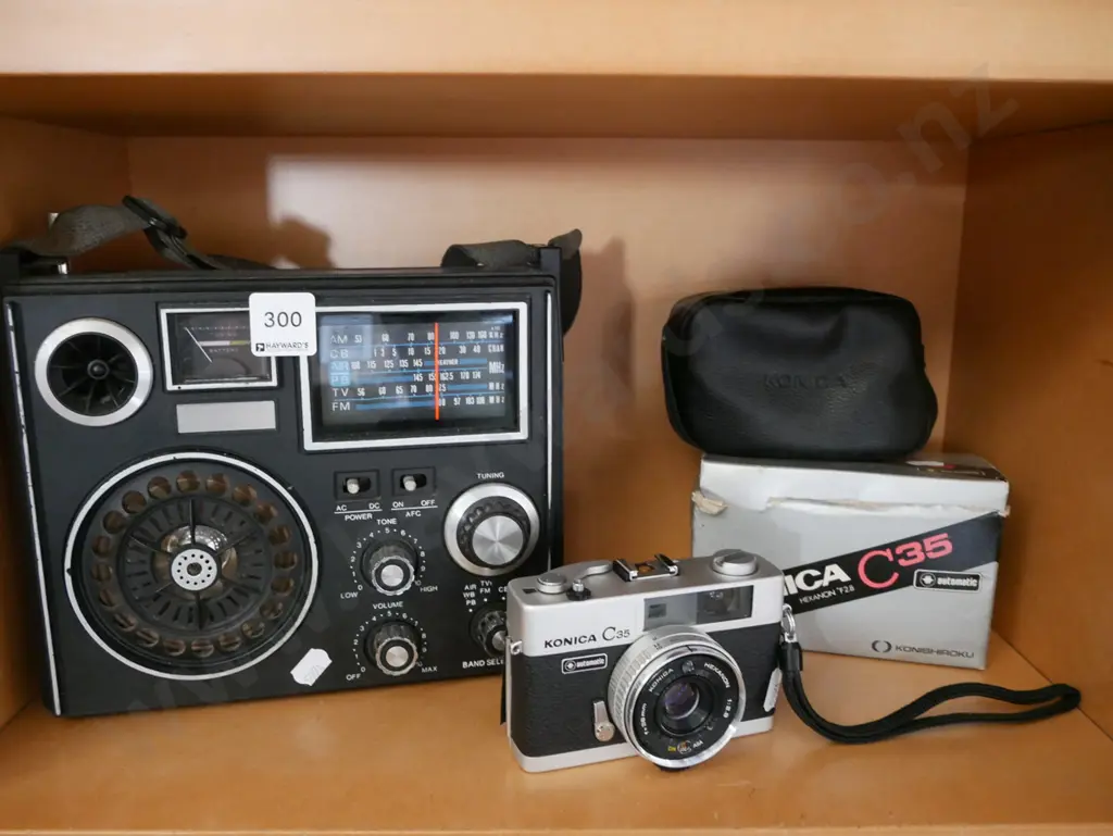 portable radio, 35mm film camera Image 1++