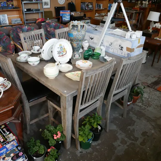 distressed wood extending dining table with 6 matching vinyl chairs 