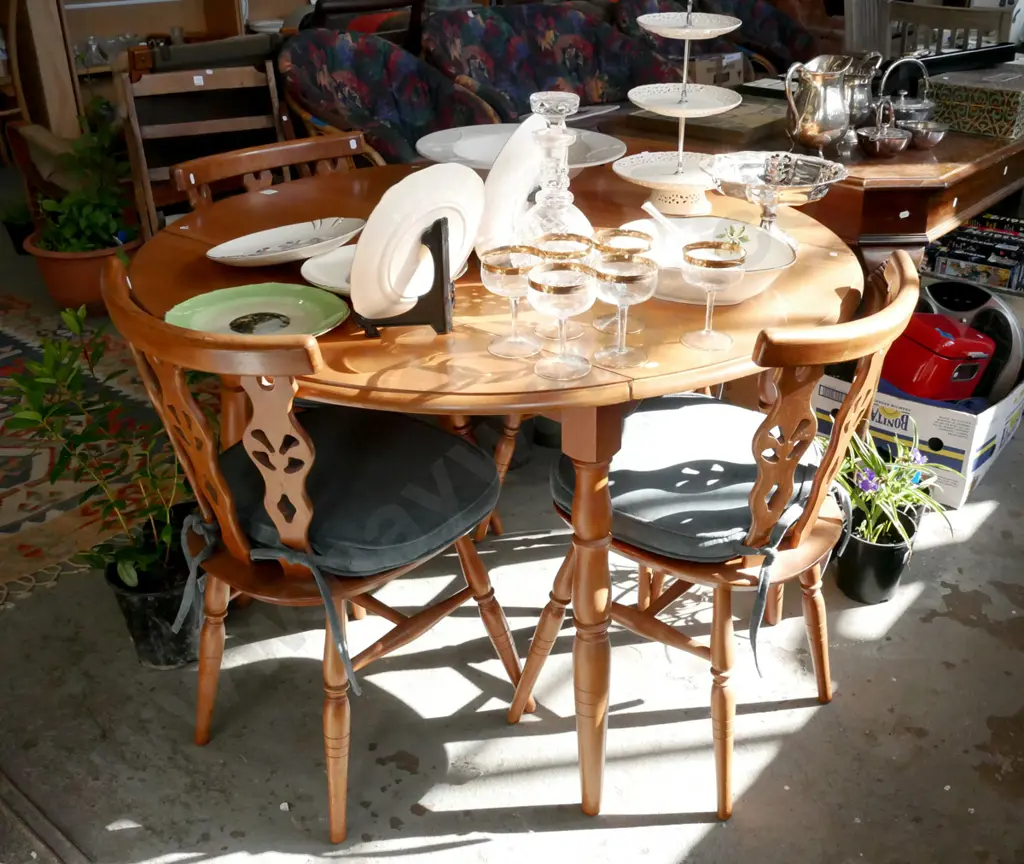solid wood circular drop side dining table with 4 matching chairs with cushions Image 1++