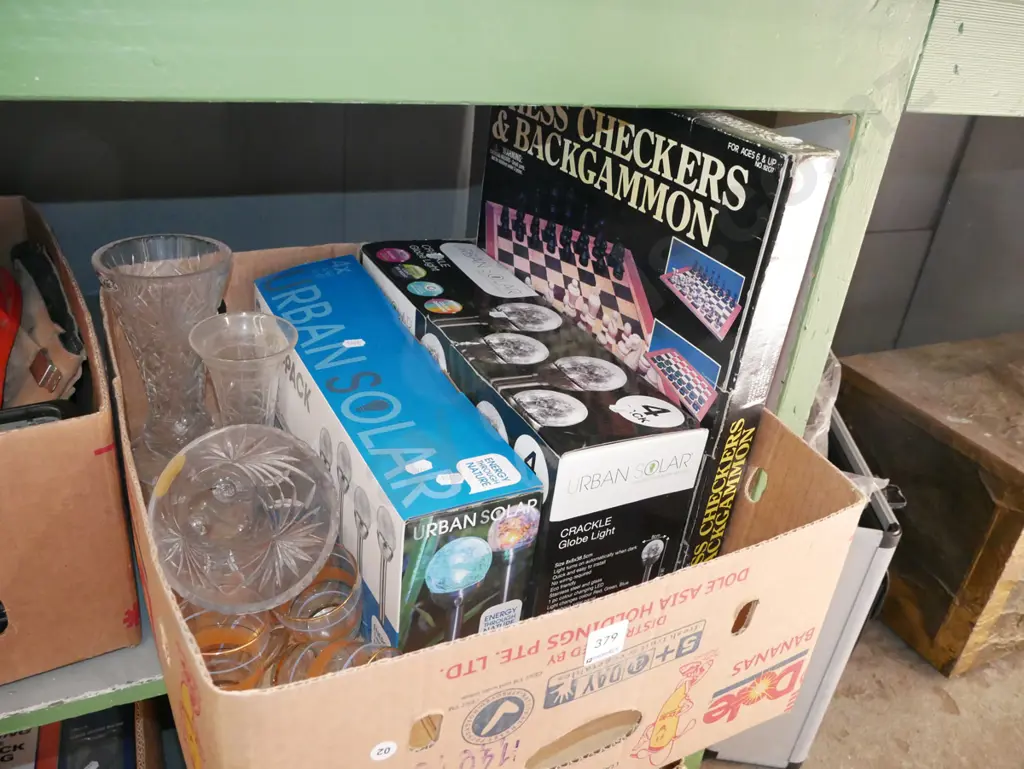 box; slar powered lighting, checkers, glassware  Image 1++