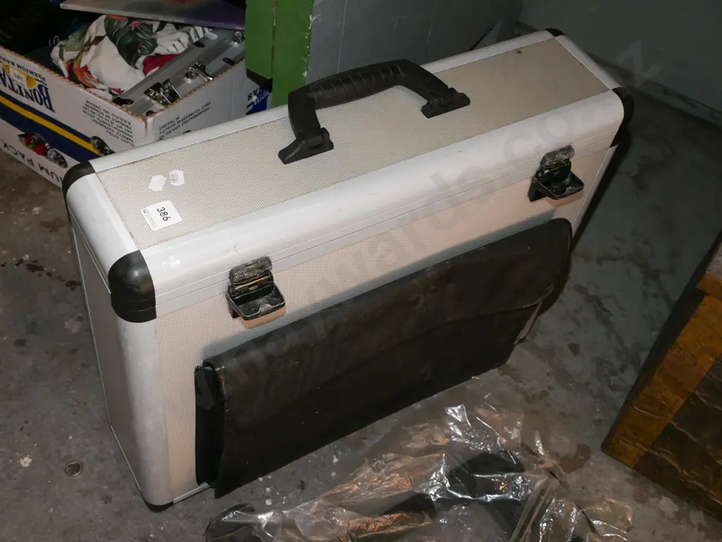 hard shell equipment case with trolley handled wheels Image 1++