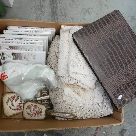 box; crochet work, DVDs, photo album etc