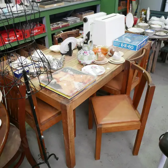 solid pine table with 5 vinyl chairs - table needs refinishing, chairs need a clean