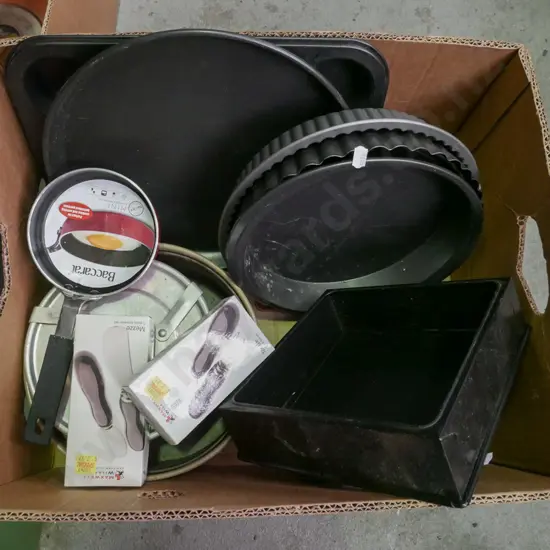box of baking and cake tins, muffin trays etc