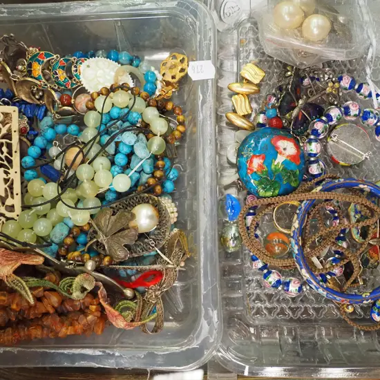 2x plastic containers of costume jewellery