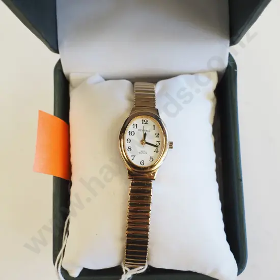 cased ladies golden watch