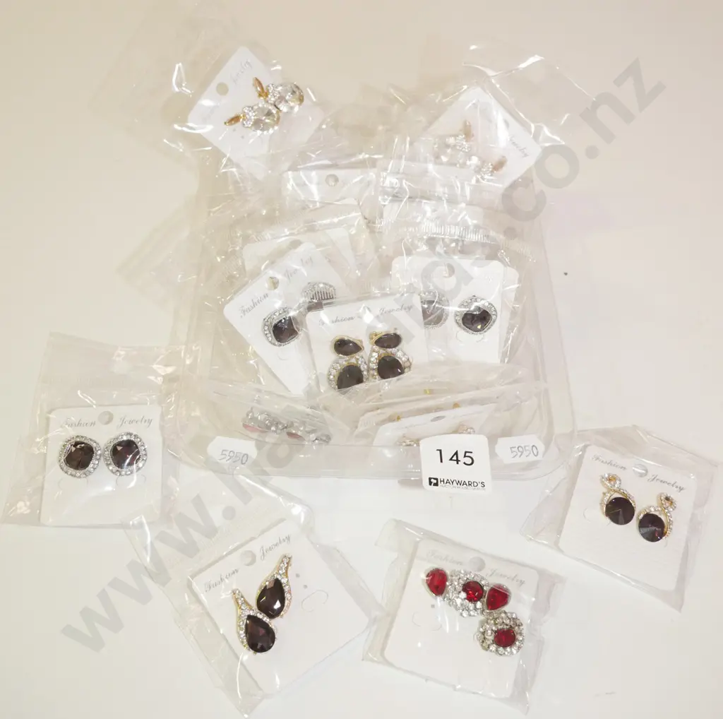 tray of costume earrings Image 1++