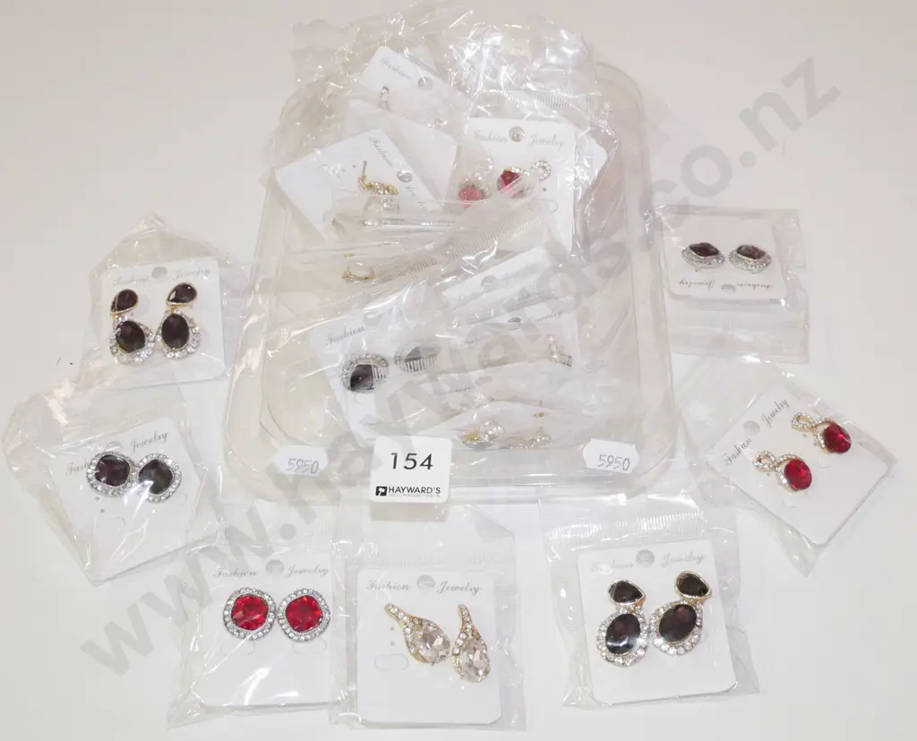 tray of costume earrings Image 1++