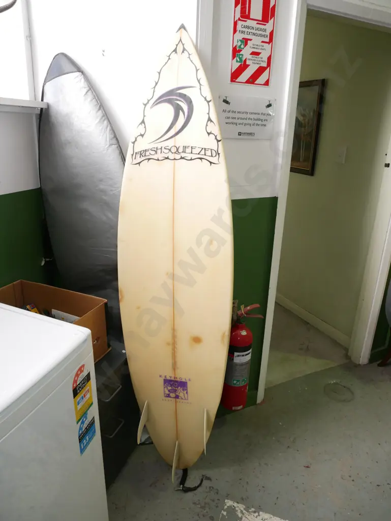 Freshly Squeezed brand surfboard in bag - see photos for details and specs. Image 1++