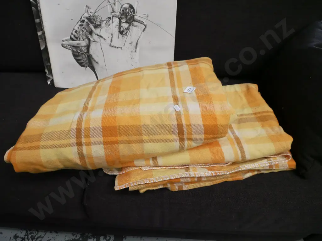 2x orange and yellow checked blankets Image 1++