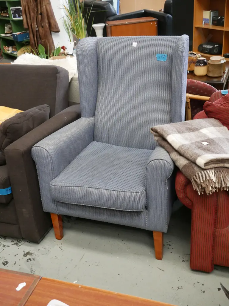 blue striped upholstered wingback fireside chair Image 1++