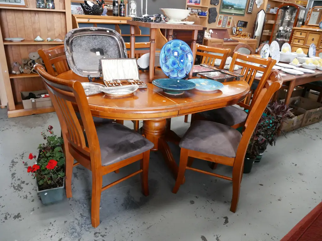 solid pine extending dining table with 6 matching chairs - slight wear to varnish  Image 1++