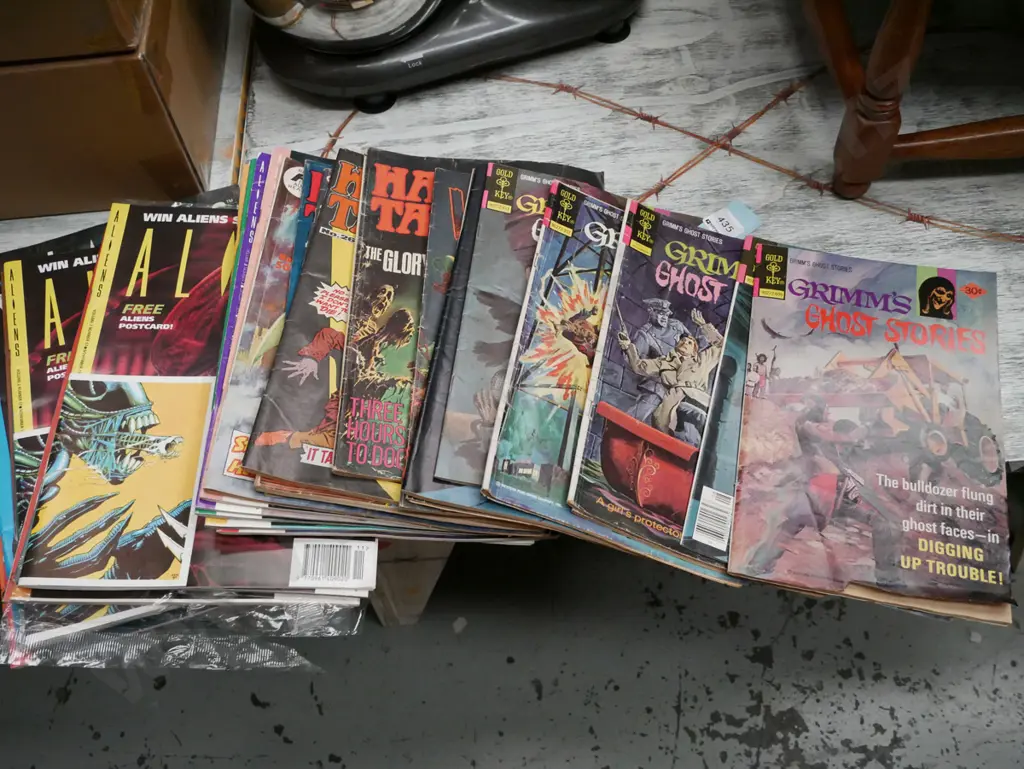 stack of comic books Image 1++