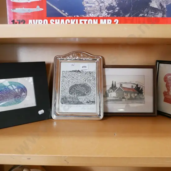 shelf of prints