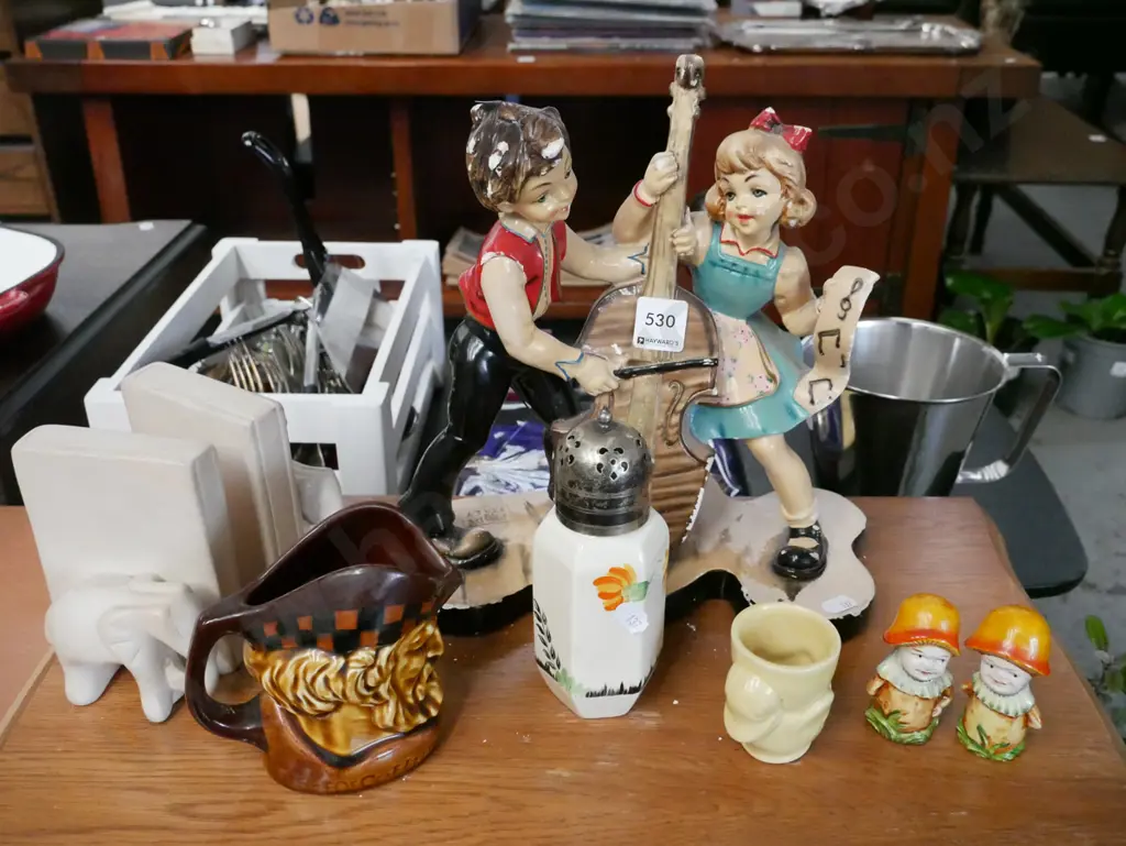 Italian boy and girl playing cello figurine, elephant bookends, small whisky jug etc Image 1++
