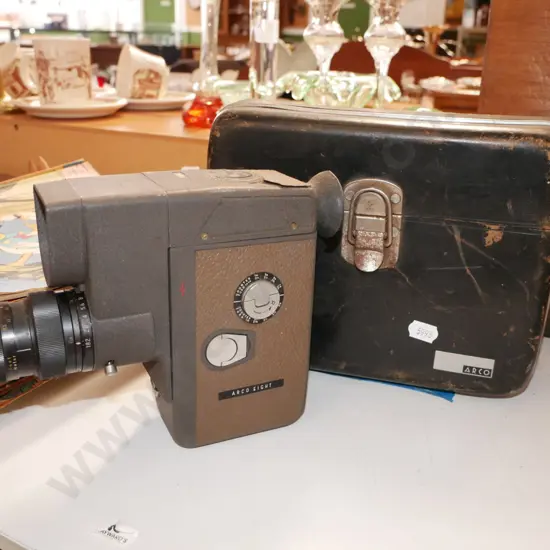 vintage home movie film camera and leather case