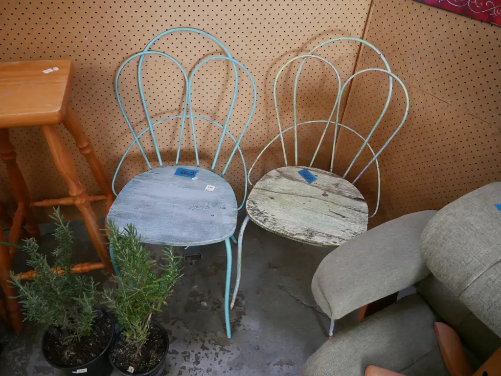pair of wrought and wood outdoor chairs Image 1++