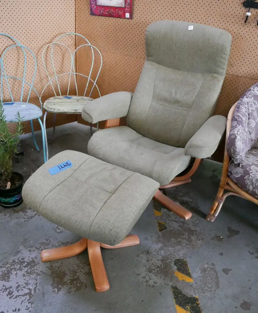 Norwegian green upholstered swivel armchair with matching footstool Image 1++