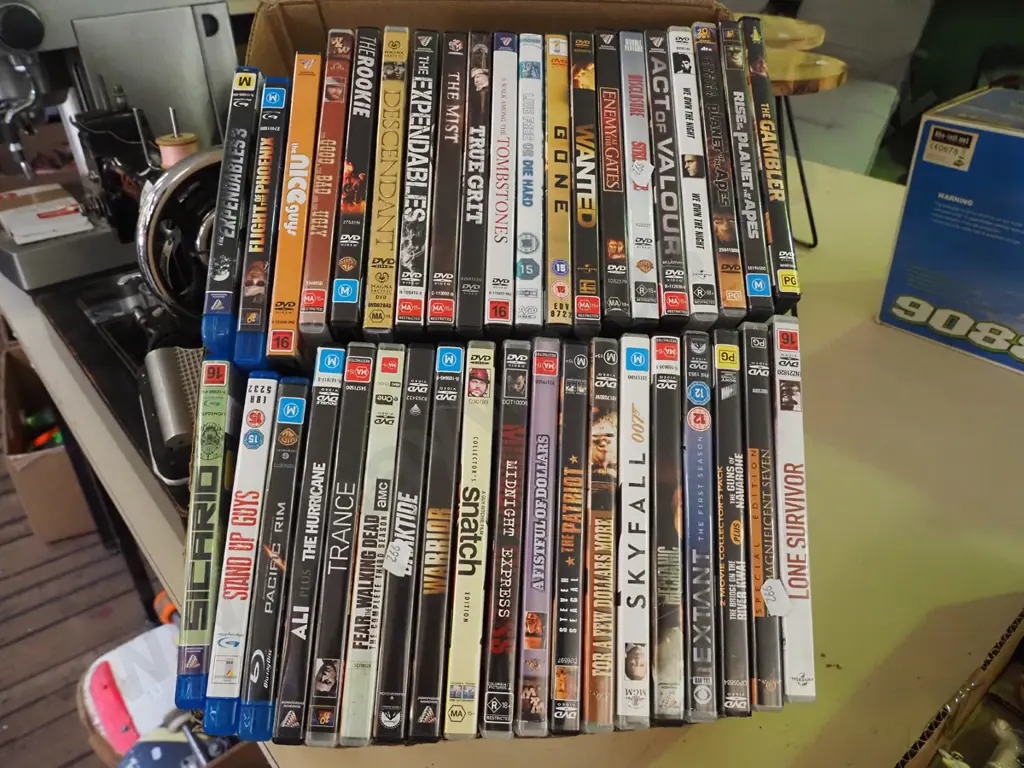 box of DVDs Image 1++