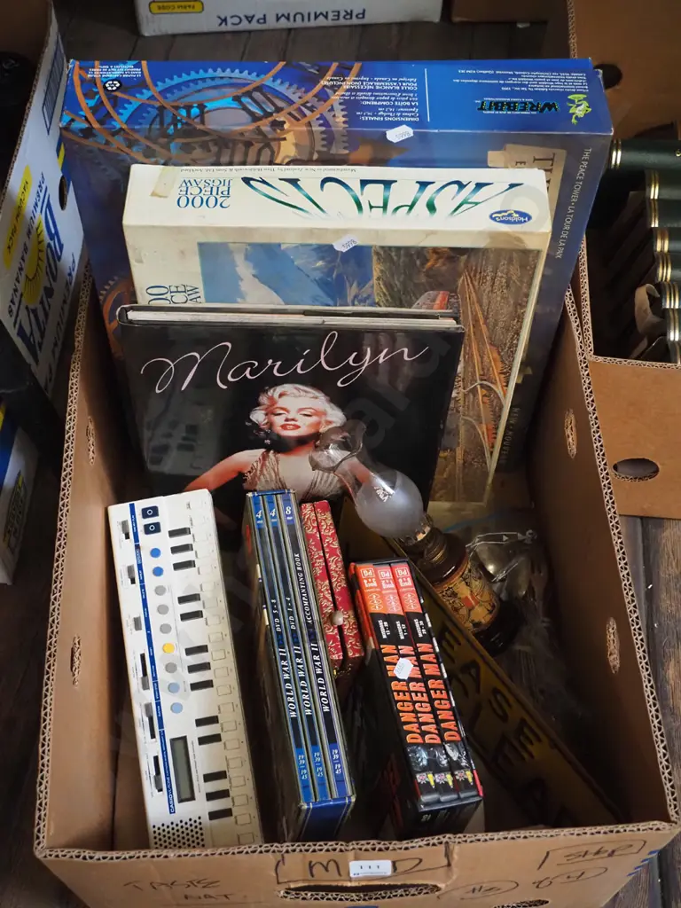 box; puzzles, DVDs, small Casio keyboard etc Image 1++