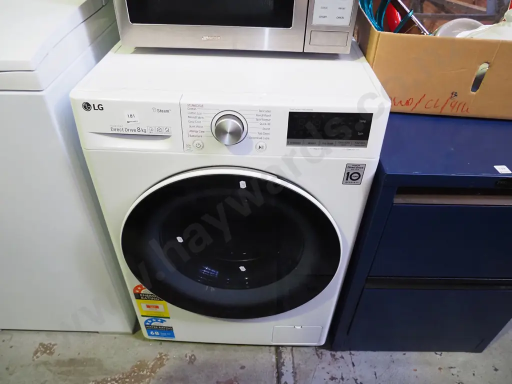 LG front load washing machine with steam cycle Image 1++