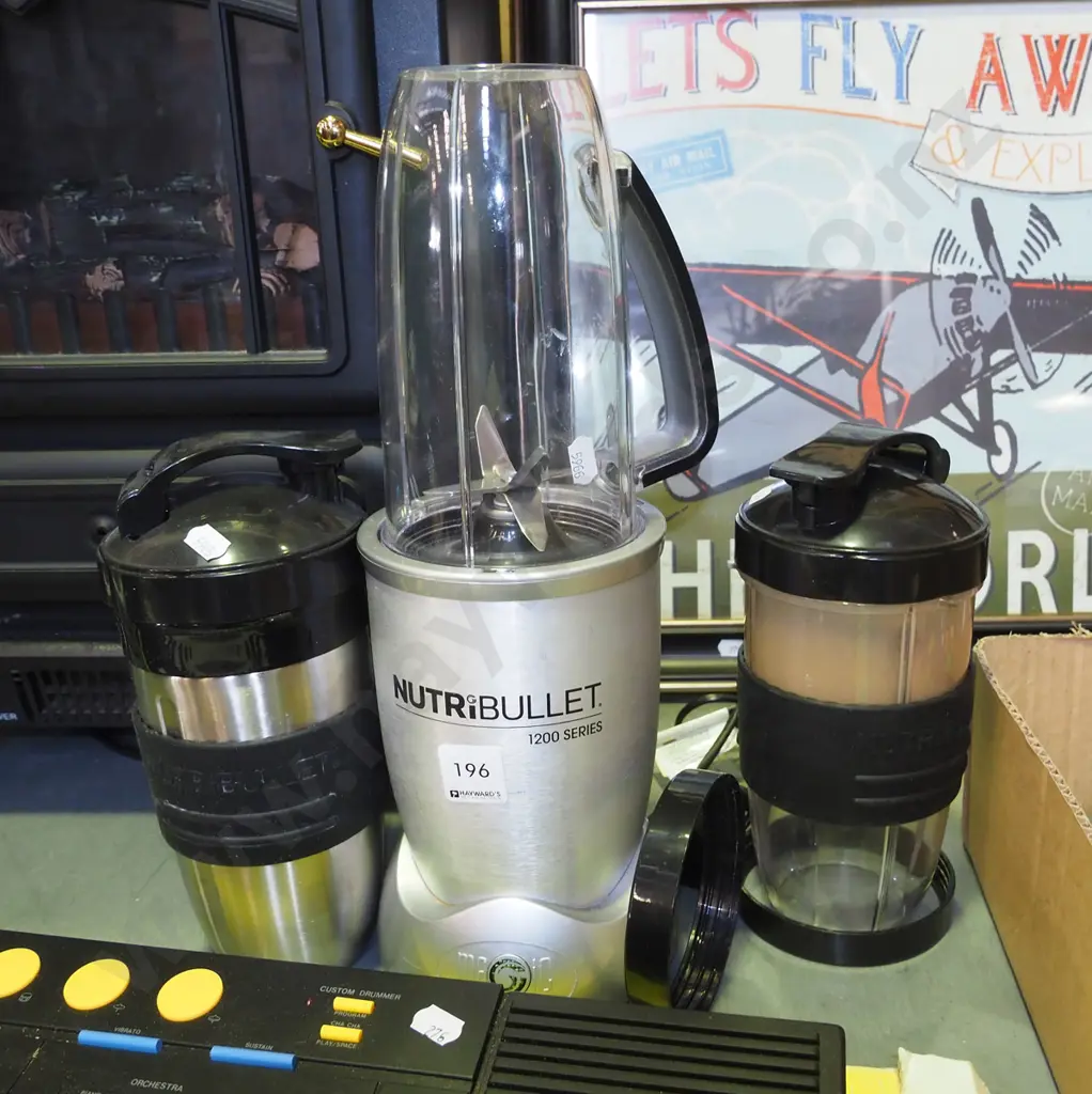 Nutri Bullet with additional canisters Image 1++