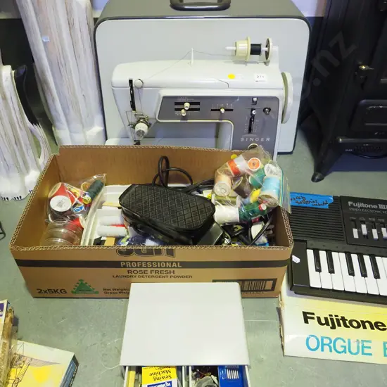 Singer sewing machine and accessories - yellow dots