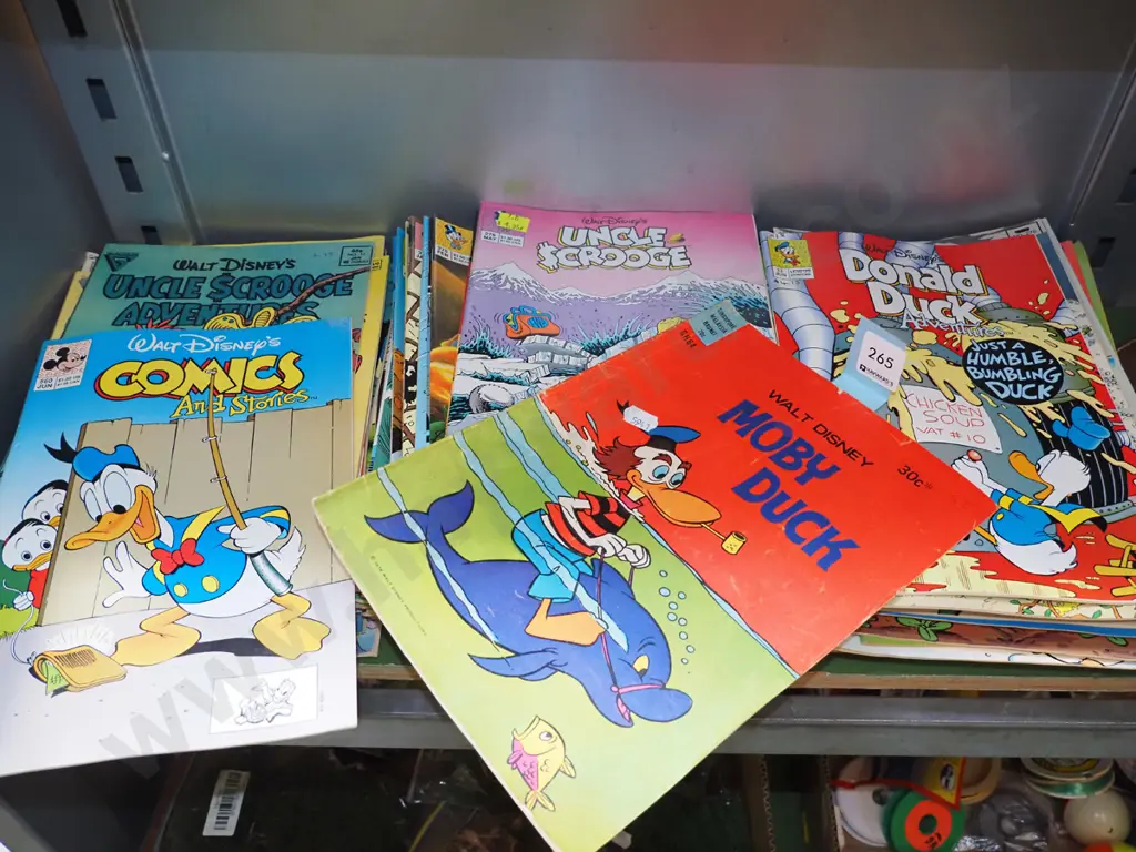 2x stacks of Donald Duck comic books Image 1++