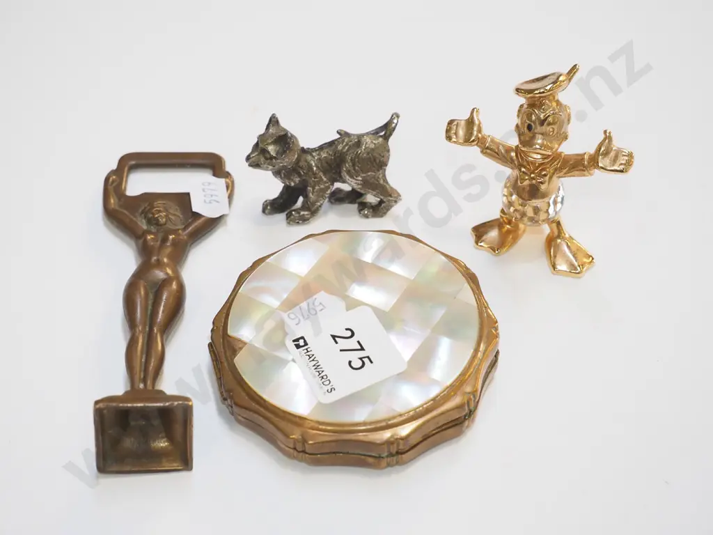 powder compact, bottle opener, Donald Duck figurine, cat figurine Image 1++