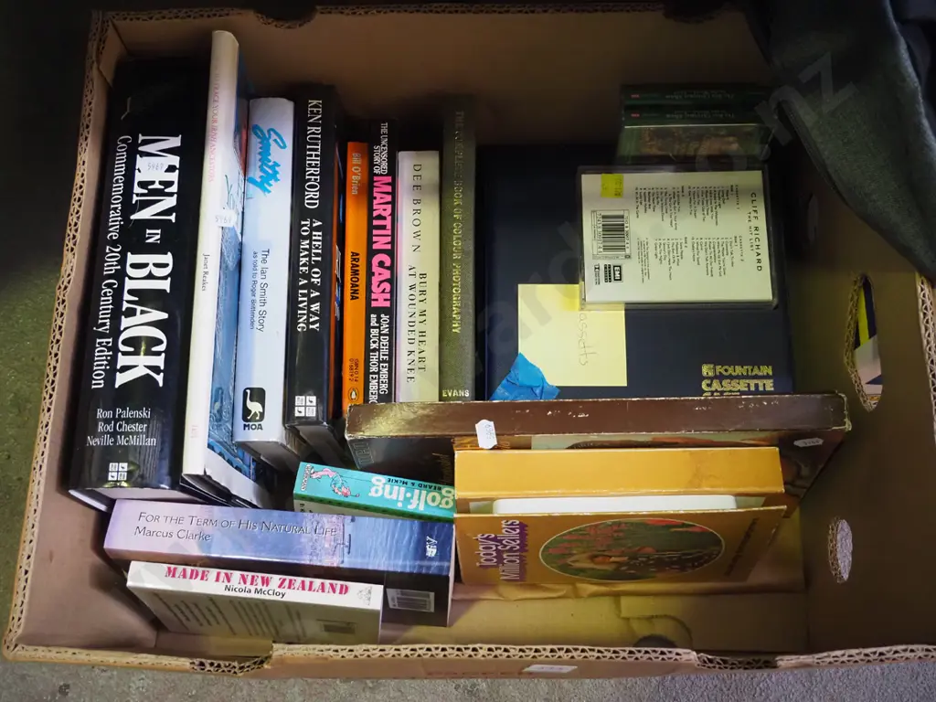 box of books, tape cassettes Image 1++