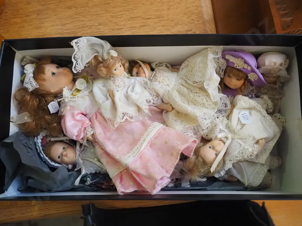 box of miniature dolls Image 1++