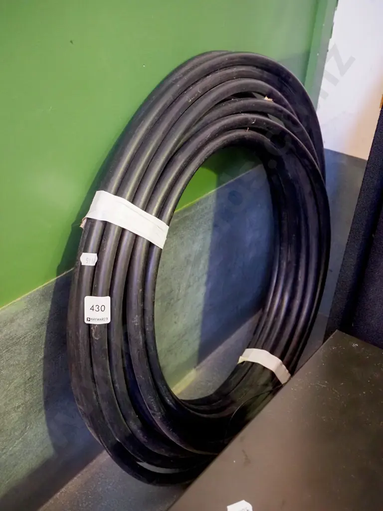 roll of black irrigation pipe Image 1++