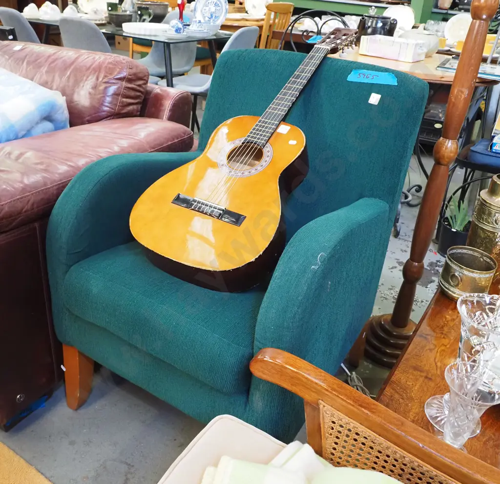green upholstered armchair Image 1++