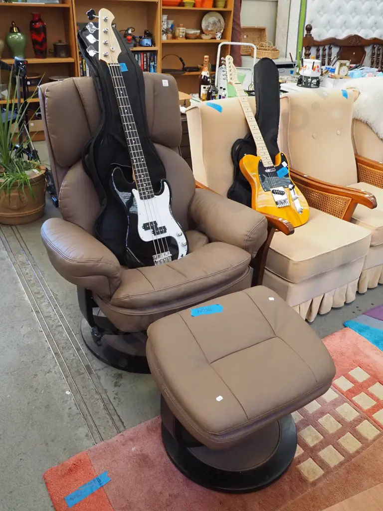 vinyl swivel reclining chair with matching footstool Image 1++
