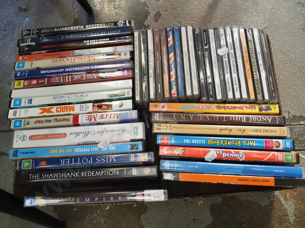 box of DVDs Image 1++