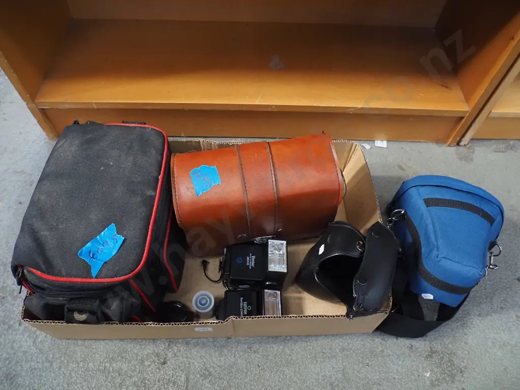 box; camera bags, flashes, 35mm film Image 1++