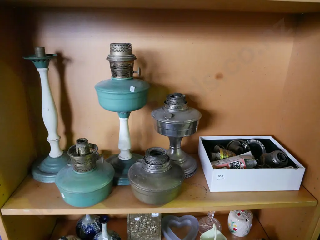 shelf of kerosene lantern parts Image 1++