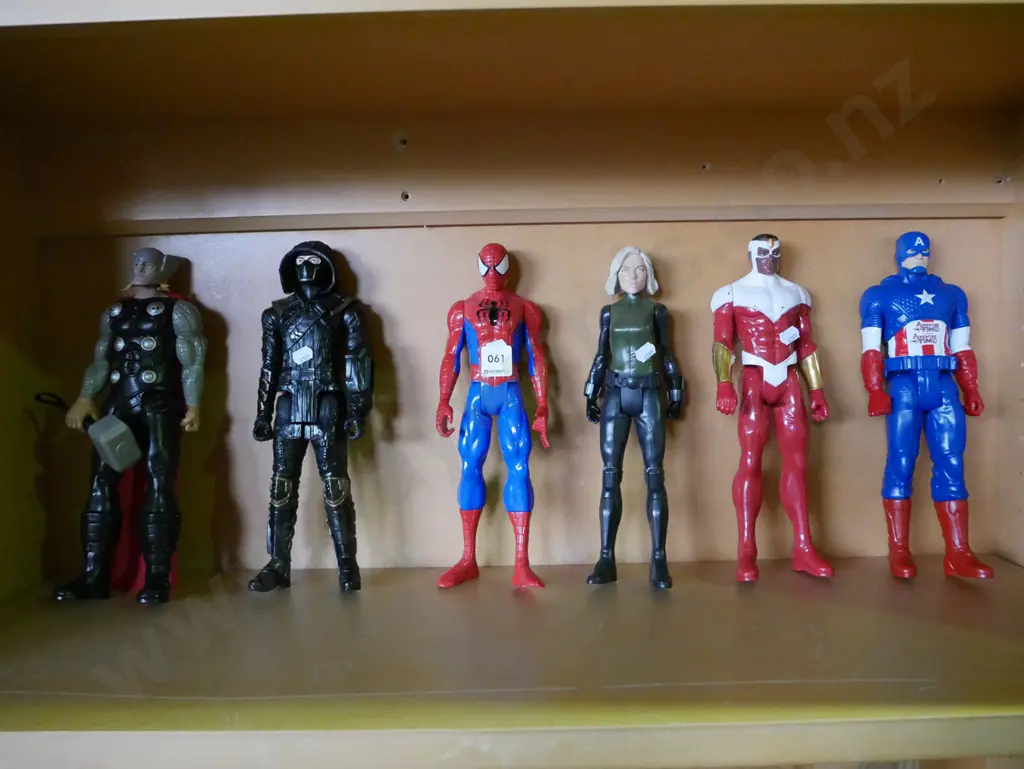 shelf of action figurines Image 1++
