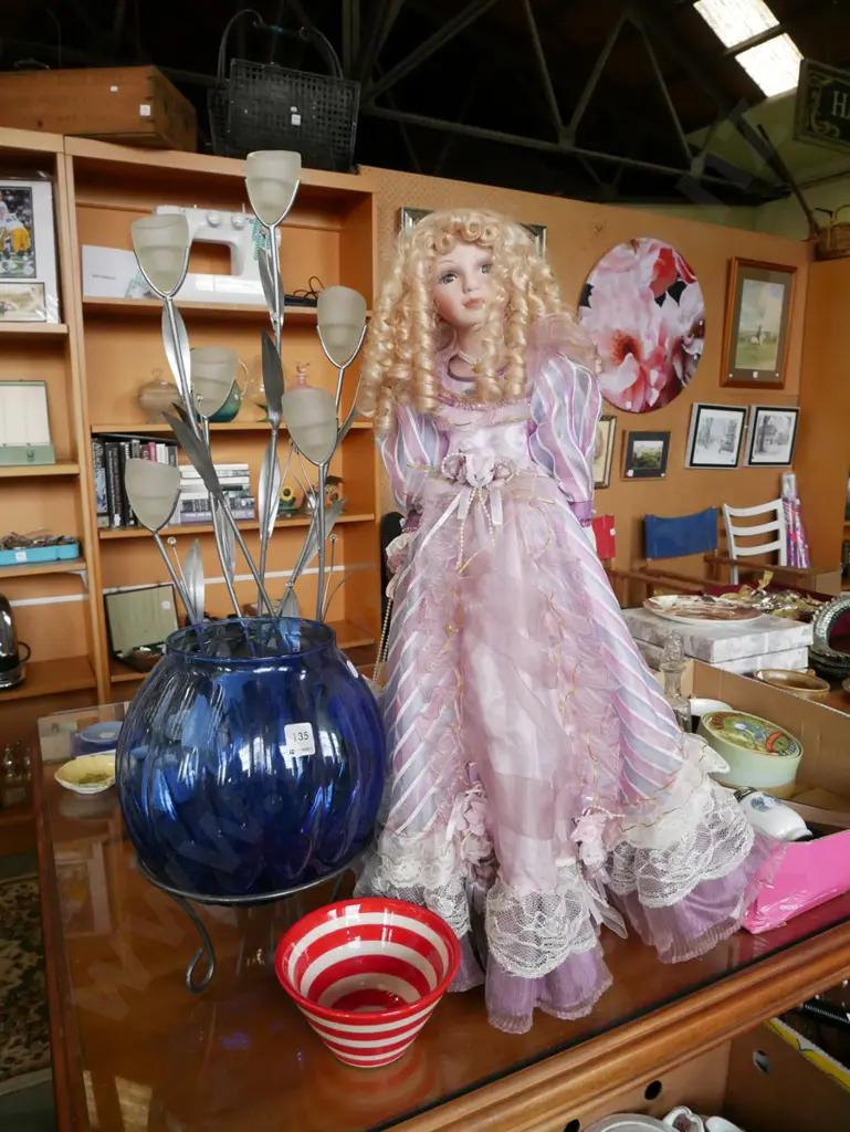 floral themed candelabra H-770, blue glass bowl on metal stand, pottery bowl, unusual porcelain half doll in glass vase Image 1++