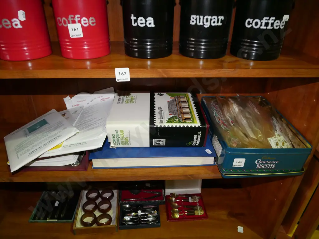 shelf; loose stamps, stamp albums Image 1++