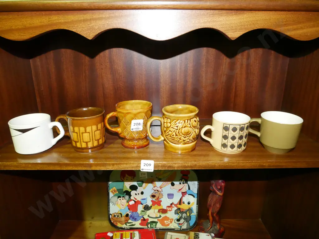 shelf of coffee cups Image 1++