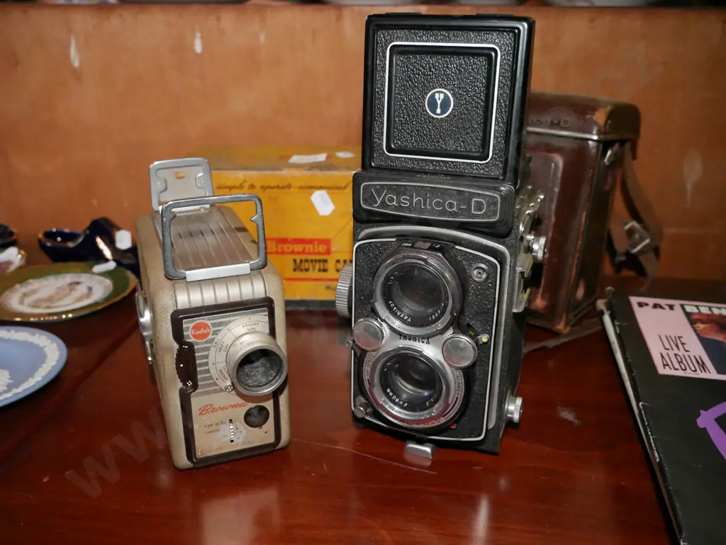 Kodak 8mm cine camera with box and Yashica-D twin lens reflex camera with case Image 1++