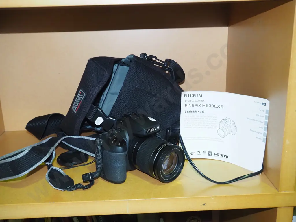 Fujifilm HS30EXR digital camera with bag and charger Image 1++