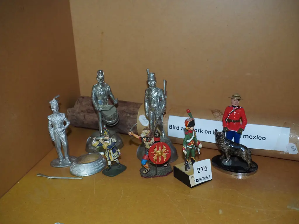 bird artwork on bark from Mexico, small military figurines Image 1++