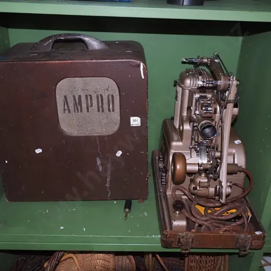 vintage Ampro 16mm film projector with speaker