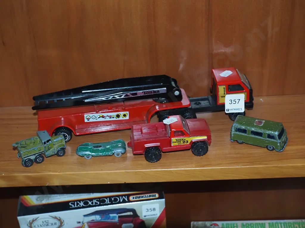 shelf of toy vehicles Image 1++