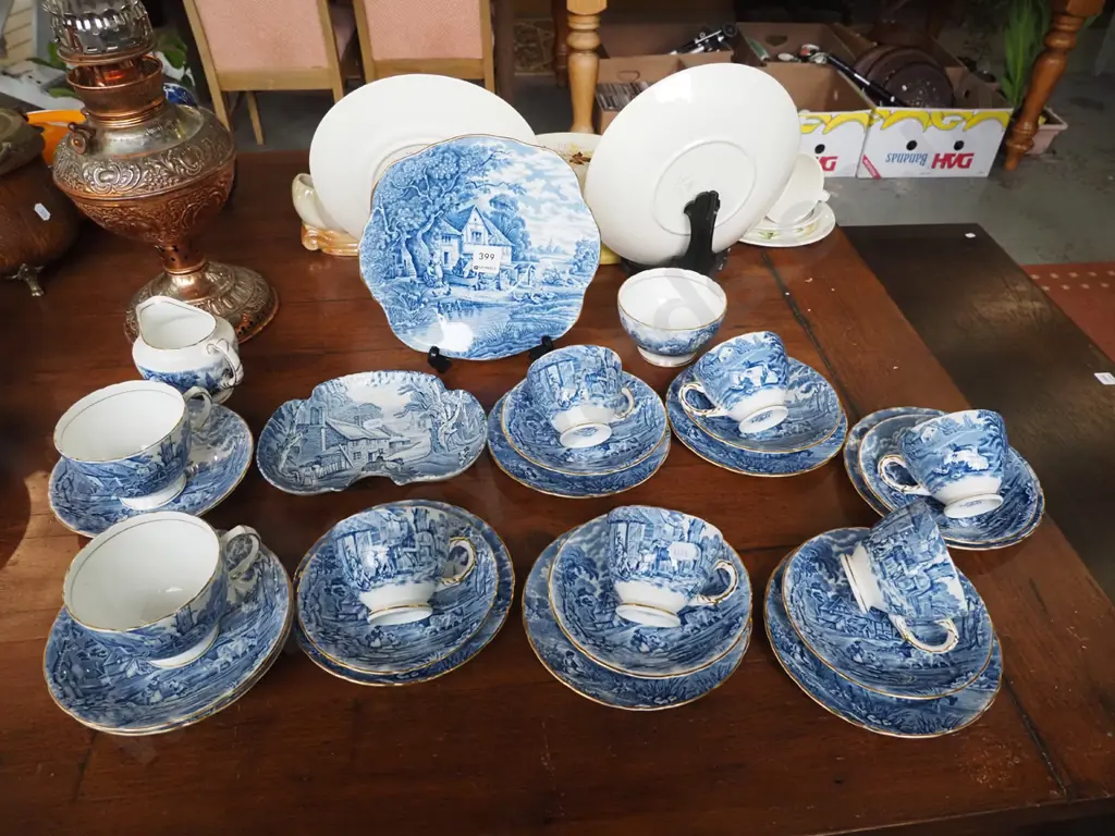 Sutherland rural scenes cups, saucers, plates, bowls, jug - crack to one cup Image 1++