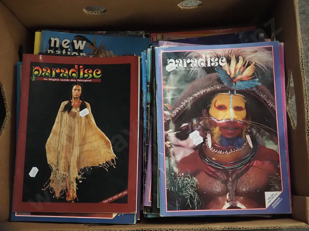 box; back issues of Paradise magazines Image 1++