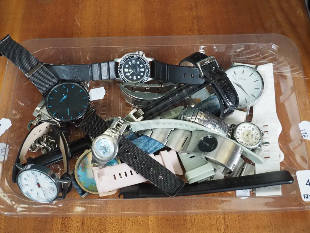 plastic tray of watches Image 1++