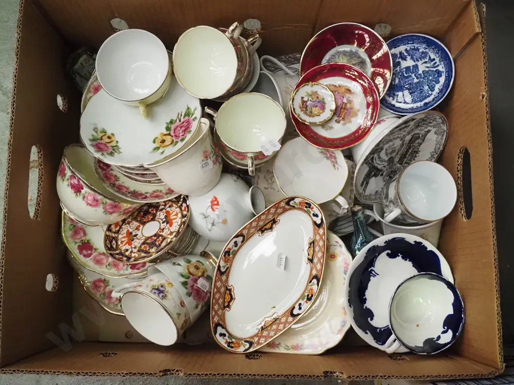 box; assorted cups, saucers, plates Image 1++